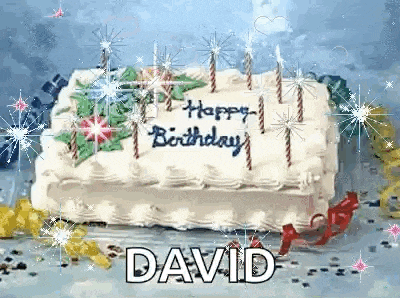a birthday cake with candles and the name david written on it