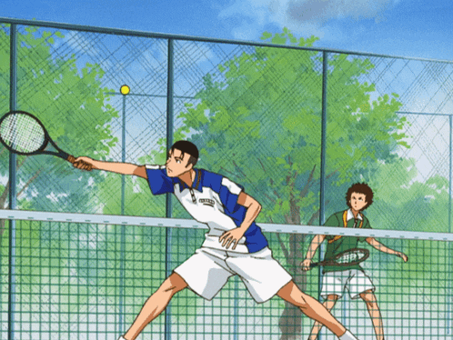 a tennis player wearing a shirt that says mizuno is about to serve the ball