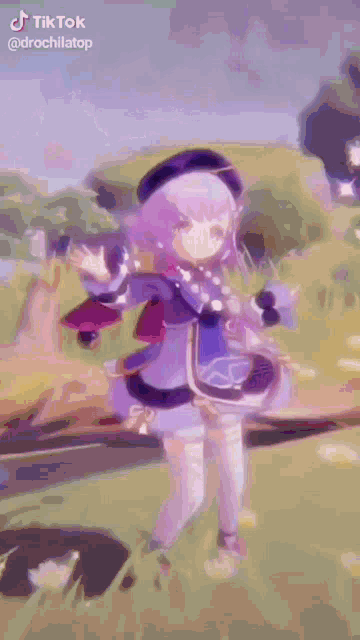a girl is standing in a field wearing a purple hat and a purple jacket .
