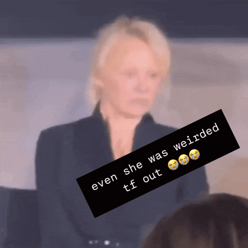 a blurred image of a woman with a caption that says even she was weird tf out