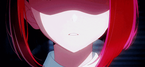 a close up of a girl 's face with red hair and a white shirt