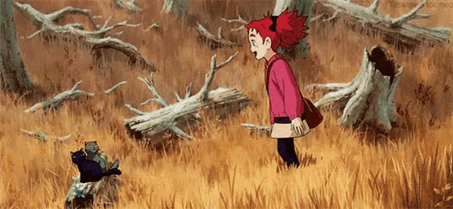 a girl with red hair is standing in a field with a cat