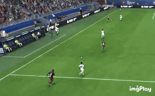 a soccer game is being played on the easports.com/fc soccer field