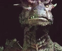 Monster Stare Looking Dragon GIF - Monster Stare Looking Dragon Taking A Closer Look GIFs