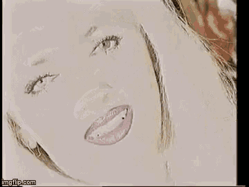 a close up of a woman 's face with a drawing of her lips and eyes .