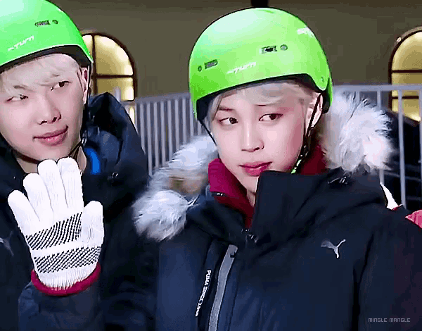 a person wearing a green helmet that says turn