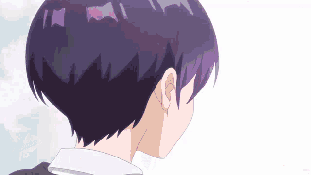 a close up of a person 's head with purple hair and a white shirt