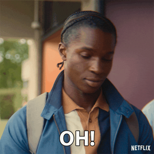 a man in a blue jacket with a backpack says " oh "