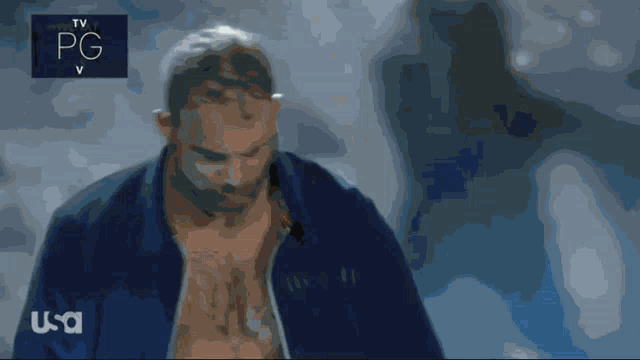 a man without a shirt is shown on a tv screen