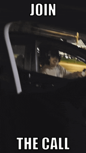 a man with a mustache is driving a car with the words join the call below him