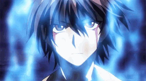a close up of a person 's face with blue flames coming out of it .