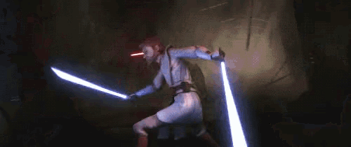 a person is holding a light saber in their hand