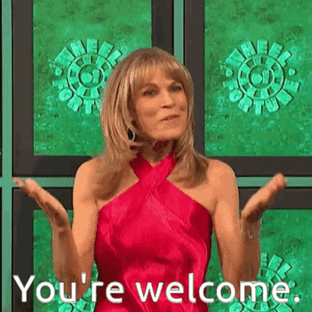a woman in a red dress says you 're welcome .