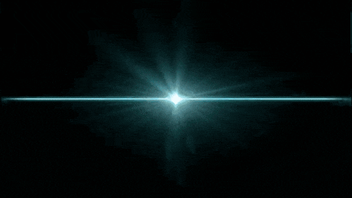 a bright blue light is shining on a black background .