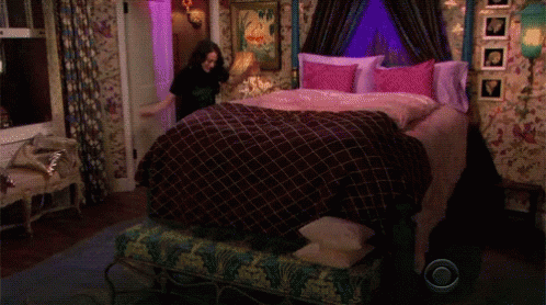 Kat Dennings Jumping To Bed GIF - Kat Dennings Jumping To Bed 2broke Girls GIFs