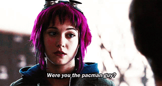 a woman with purple hair is asking if she is the pacman guy