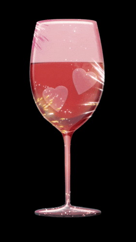 a wine glass with two hearts in it