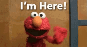 elmo from sesame street is standing in front of a door and says `` i 'm here ! ''