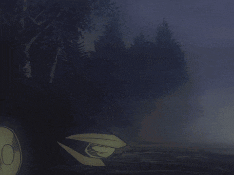 a dark landscape with a few trees and a few lights