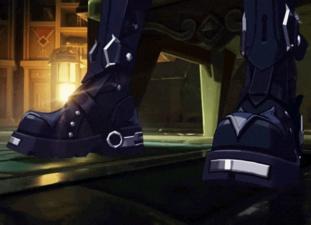 a person wearing a pair of black boots with a silver buckle on the bottom