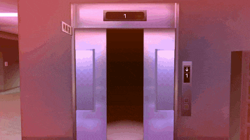 an open elevator with the number 1 on the door
