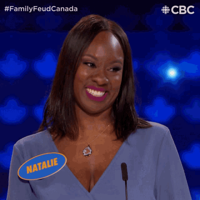 a woman with natalie written on her name tag