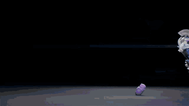 a robot in a purple and white outfit is dancing on a stage
