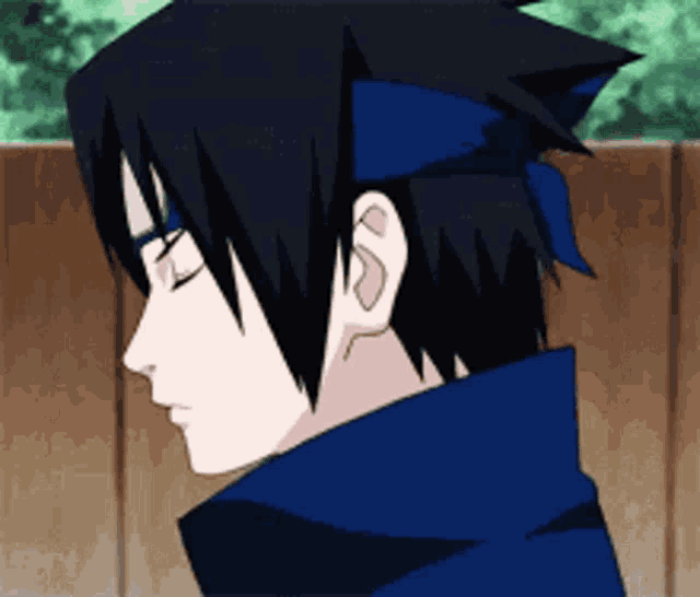 a close up of a person 's face with a blue headband on