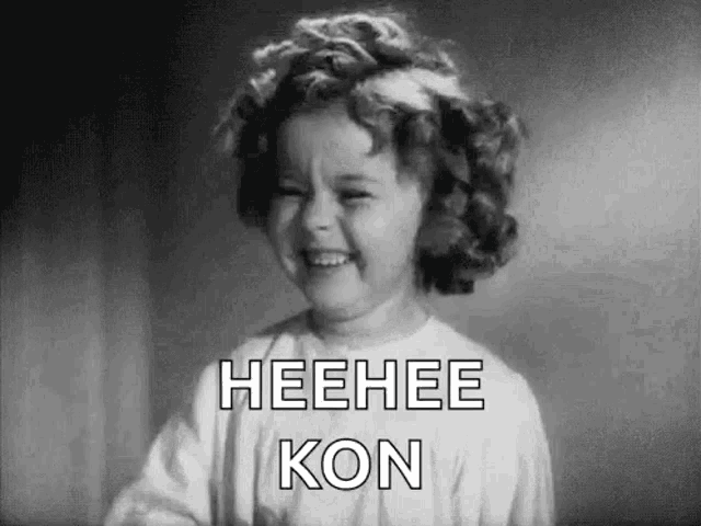 a black and white photo of a little girl laughing with the words `` heehee kon '' .