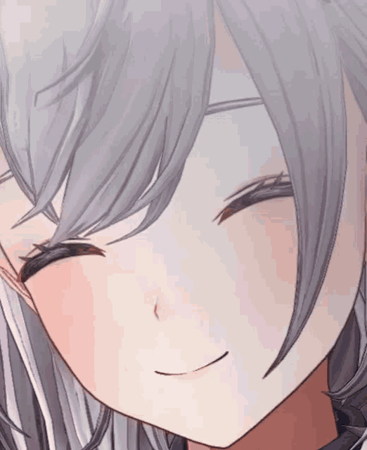 a close up of a girl 's face with a smile on it