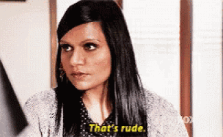 a woman is saying that 's rude while looking at something .