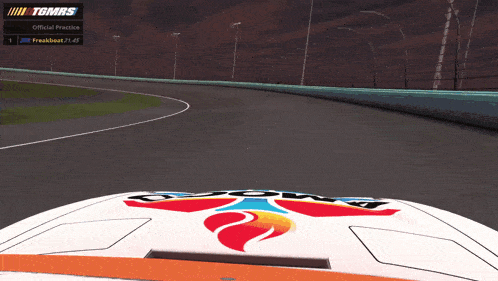a tgmrs race car is driving down a track