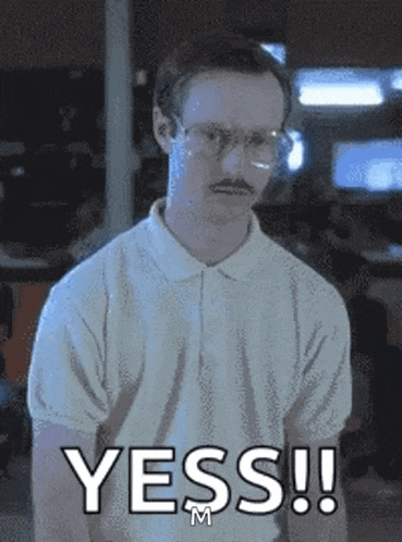 a man with glasses and a mustache says yess !!