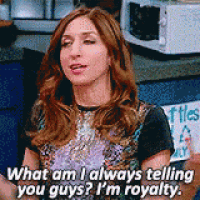 a woman is sitting in front of a microwave and saying what am i always telling you guys ? i m royalty