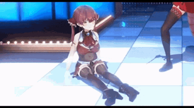 a girl in a red dress is sitting on the floor on a checkered floor .
