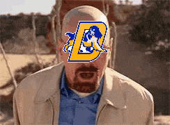 a bald man with a beard has the letter b on his forehead