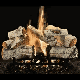 a pile of logs is burning in a fireplace with a black background