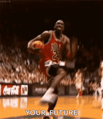 michael jordan is jumping in the air while holding a basketball in his hand .