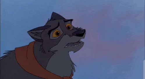 a cartoon wolf wearing a red scarf around his neck