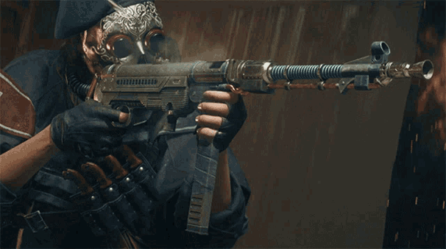 a man wearing a gas mask is holding a rifle
