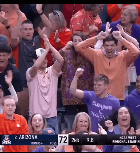 a crowd of people are watching a basketball game between arizona and clemson ..