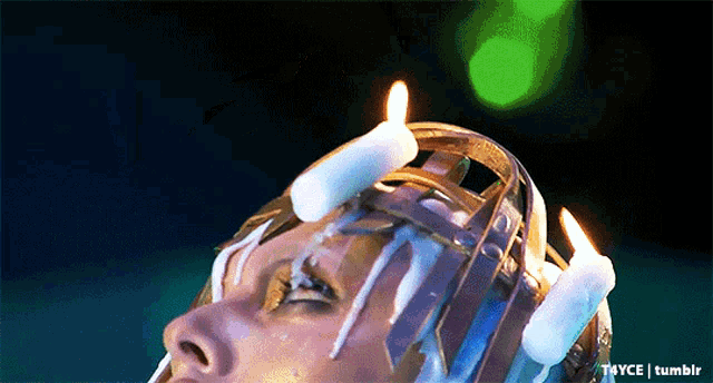 a person with candles on their head and the words tayce tumblr underneath