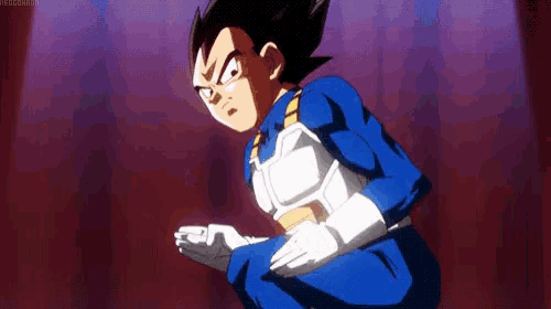 vegeta from dragon ball z is kneeling down in front of a red curtain and looking at the camera .