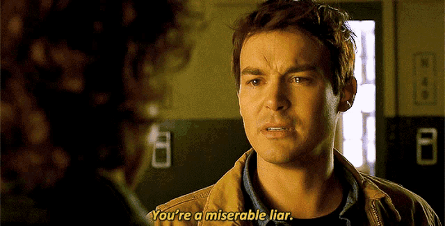 a man talking to a woman with the words you 're a miserable liar
