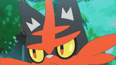 a close up of a cartoon cat with a crown on its head