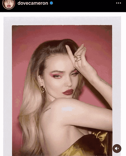 a picture of a woman with the name dove cameron on the top