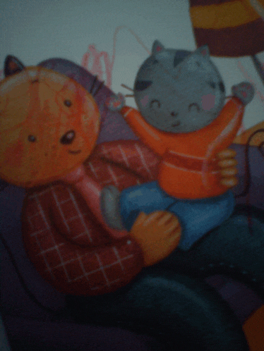 a cartoon of a man holding a cat on his lap