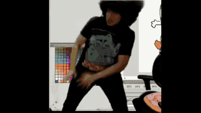 a man is dancing in front of a computer screen that says ' t120 '