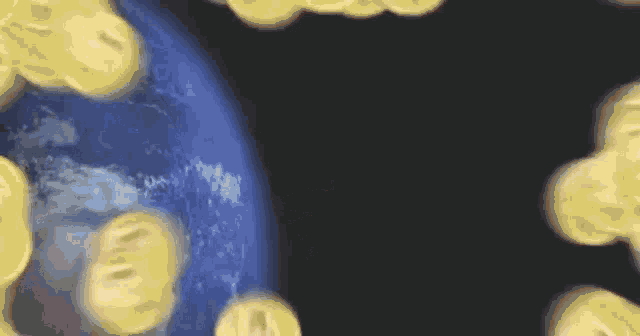 a bunch of gold coins are flying around the earth .