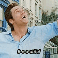a man in a blue shirt with the words be-a-utiful on his shirt